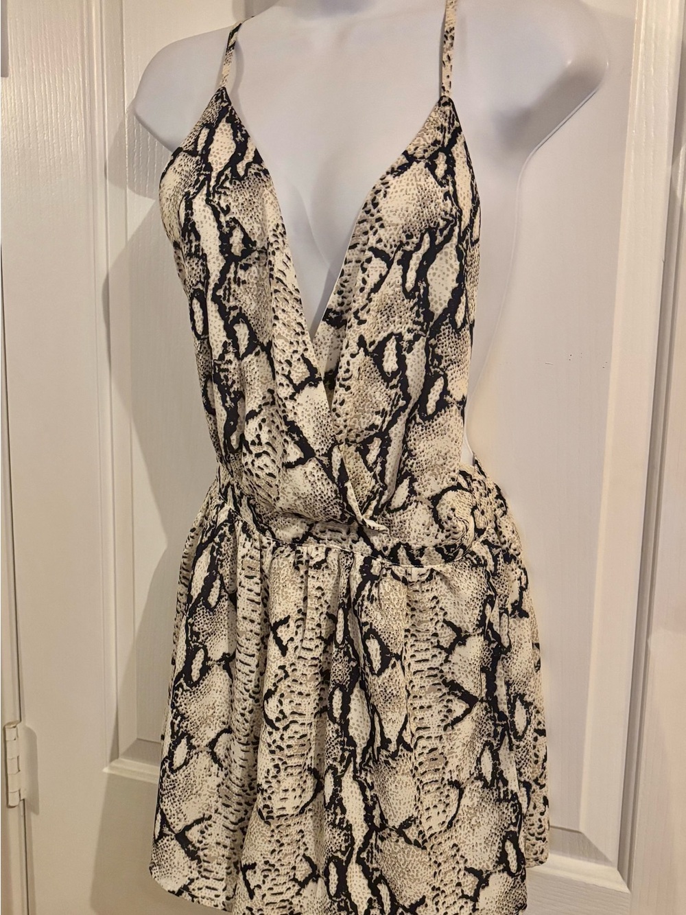 BCBG backless halter. Beige and Black Snake-Print Shorts Romper